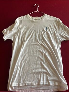 Next Level Apparel White Short Sleeve Tee with Small Blue Golfer Logo